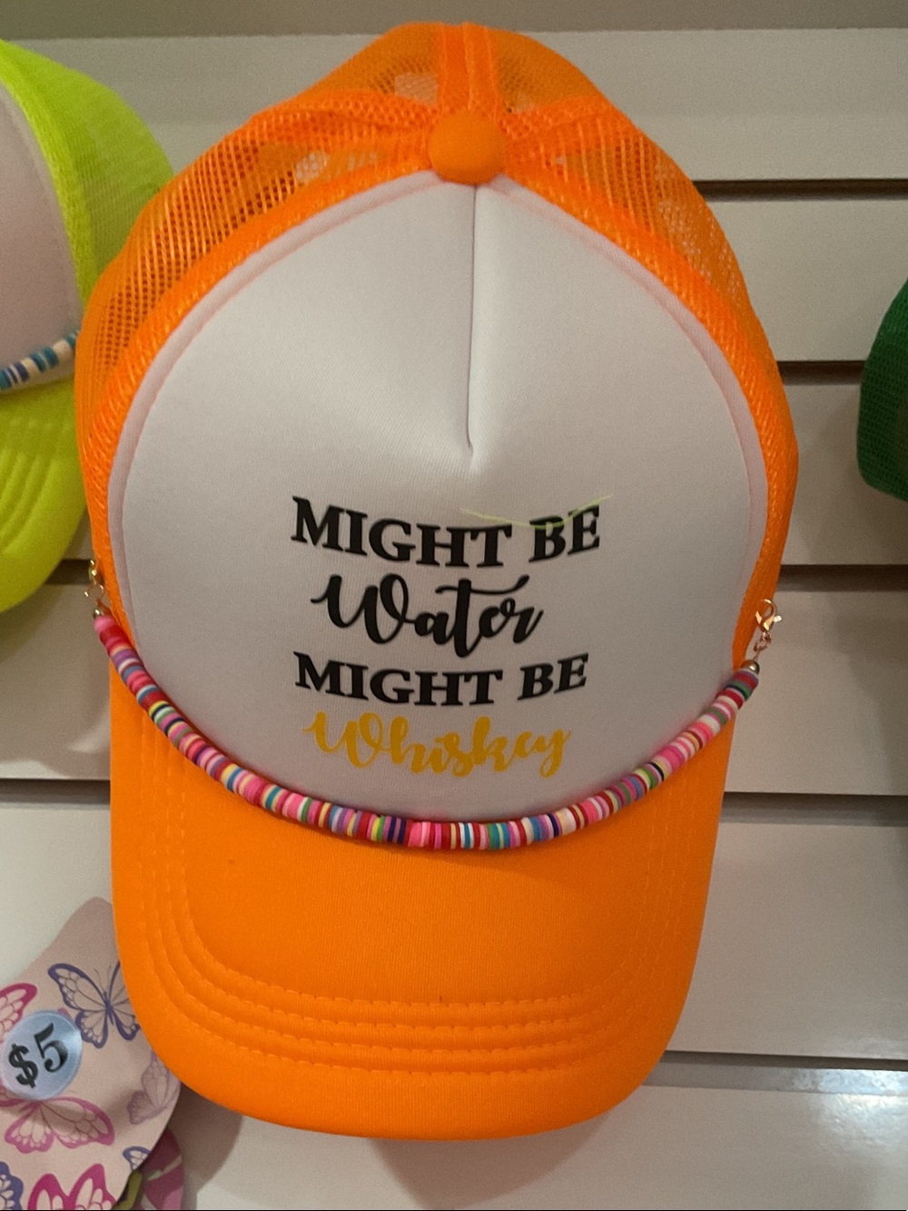 Orange and White Trucker Hat with 'Might Be Water Might Be Whiskey' Print